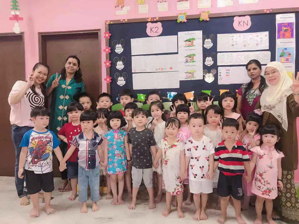 children with teachers together