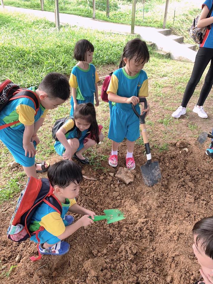 child digging holes activity
